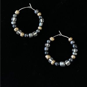 Stainless Steel earrings that are handmade with glass beads.